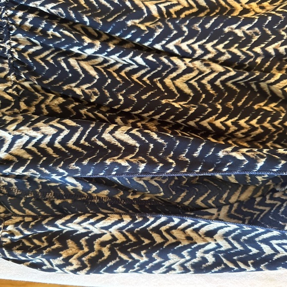 One piece jumpsuit.  Fits like a small medium. - Picture 5 of 8